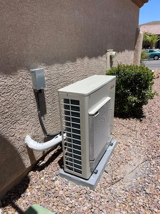 Residential air conditioning condenser unit in Windham